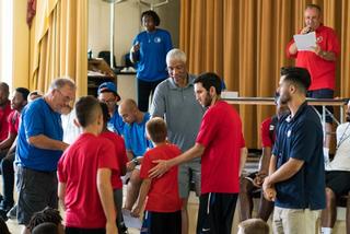 Dr. J handing out camper awards